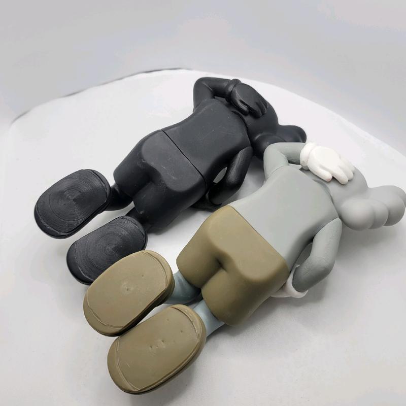 KAWS Laying Vinyl Figure 6 Inches