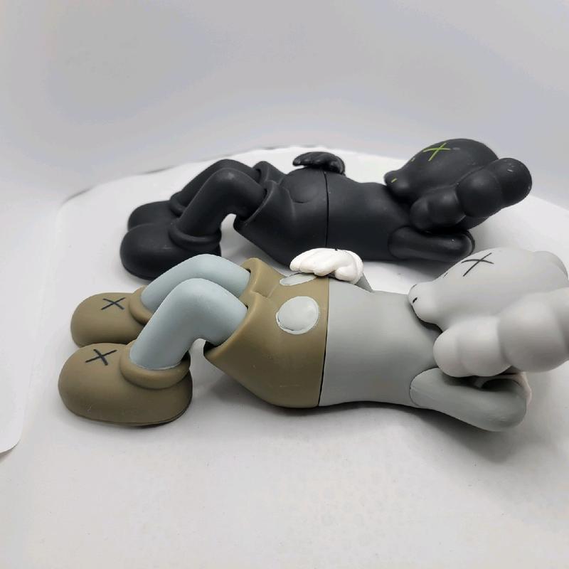 KAWS Laying Vinyl Figure 6 Inches