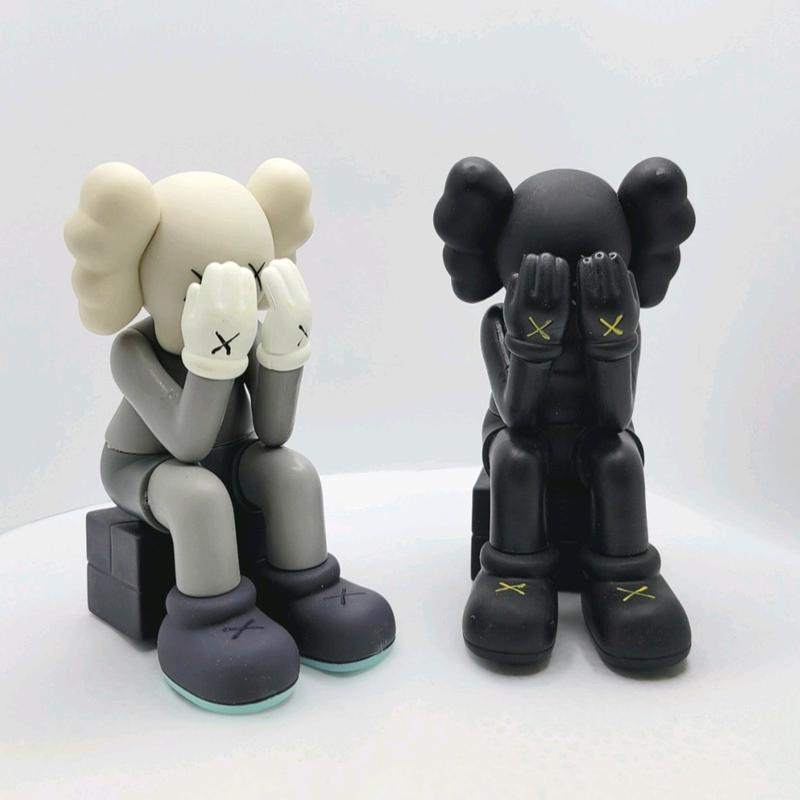 KAWS Seated Vinyl Figure 5 Inches Tall Collectible