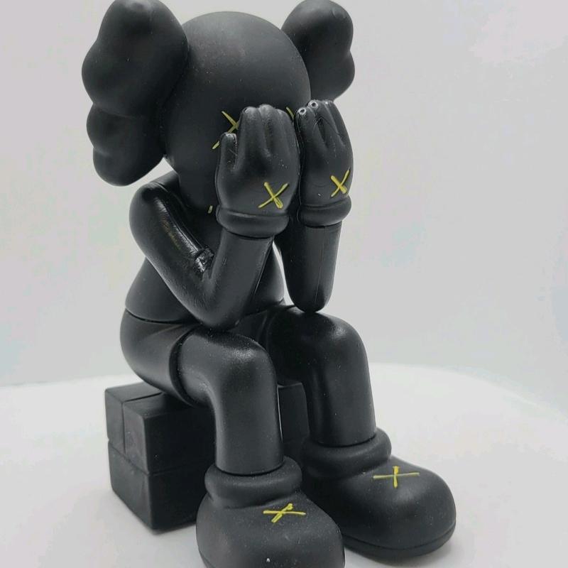 KAWS Seated Vinyl Figure 5 Inches Tall Collectible