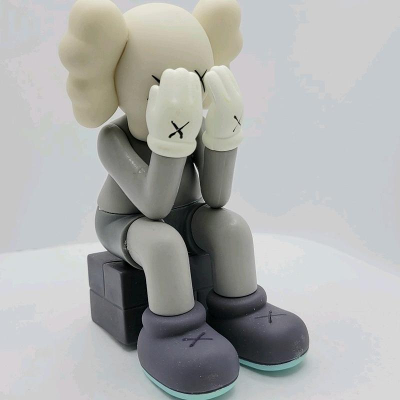 KAWS Seated Vinyl Figure 5 Inches Tall Collectible