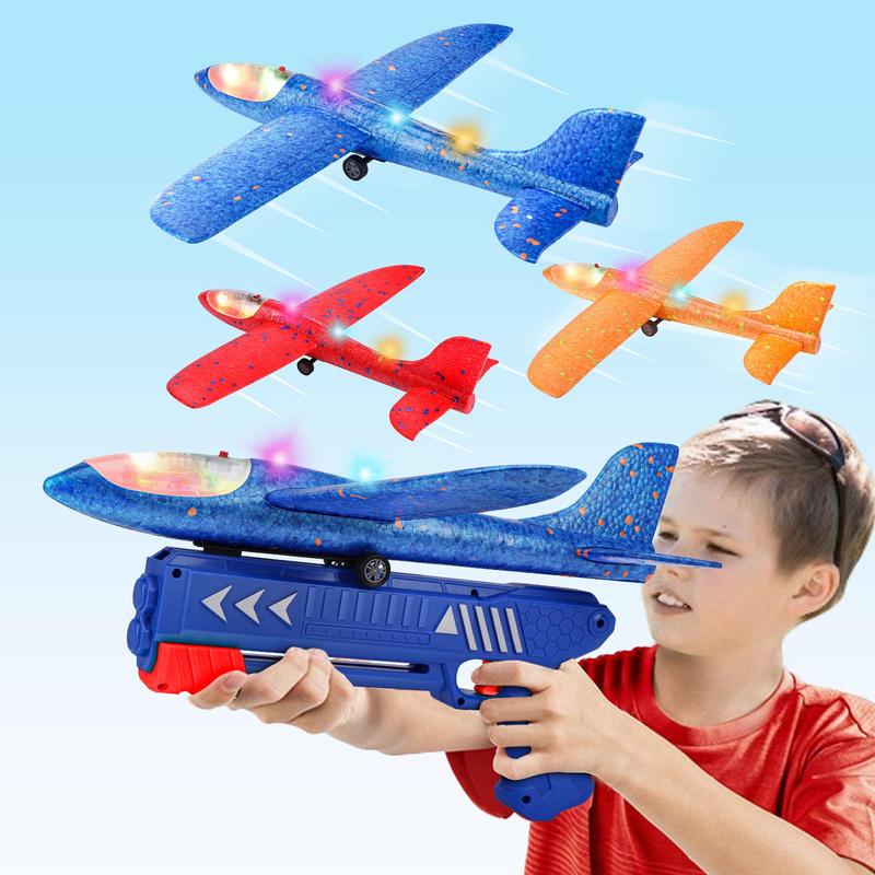 Flight Mode Catapult Plane for Kids Outdoor Sport Flying Toys Gifts.Three-Pack Airplane Large LED Dinosaur Airplane Launcher Glider Set. Foam Glider